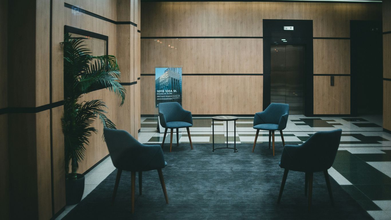 a couple of chairs that are in a room