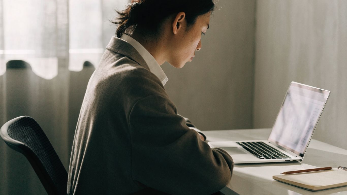 Trader reviewing a simulated trading evaluation