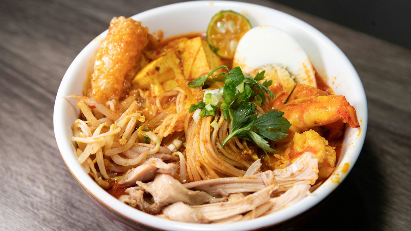 Bowl of spicy Katong laksa noodles
