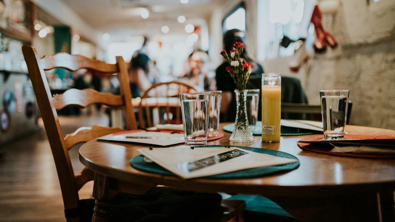 Hospitality setting with menu stands