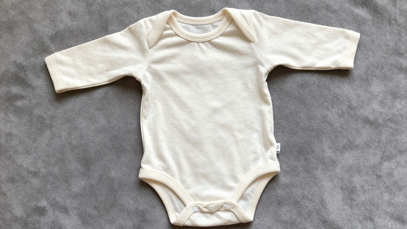 Ranita o body de bebé para recién nacido.