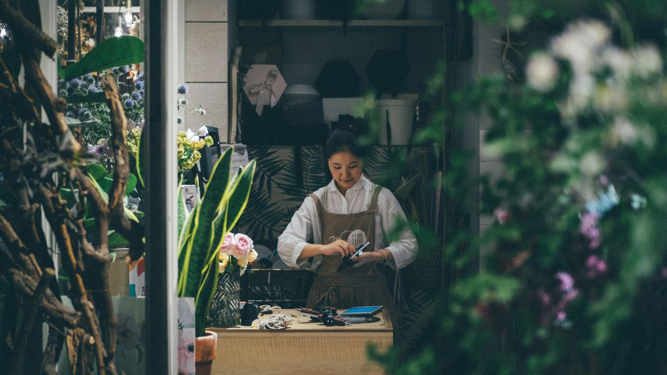 A small business owner reviewing commercial safety documents