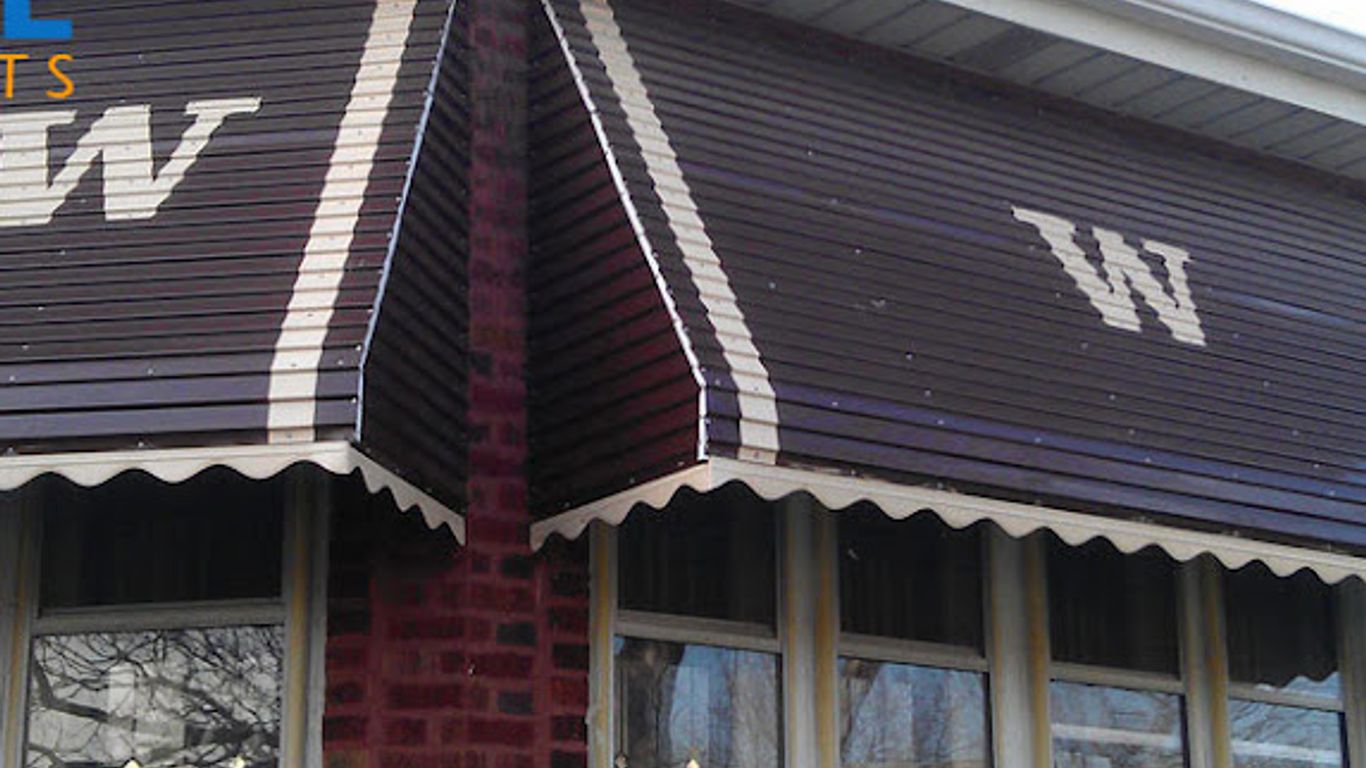 Brown awnings with white stripes and a white 'W' over windows.