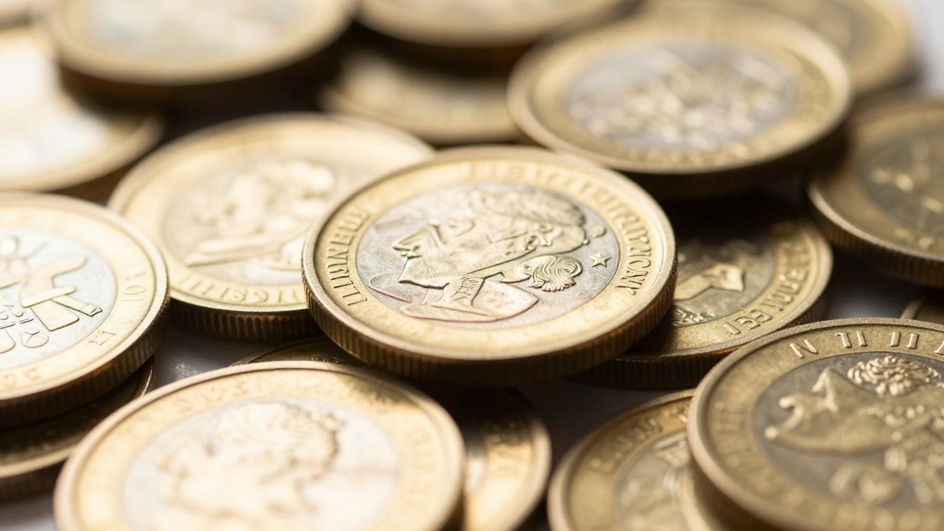 Shiny gold coins piled up and scattered.