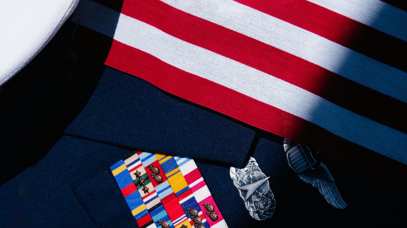 a close up of a tie and a shirt