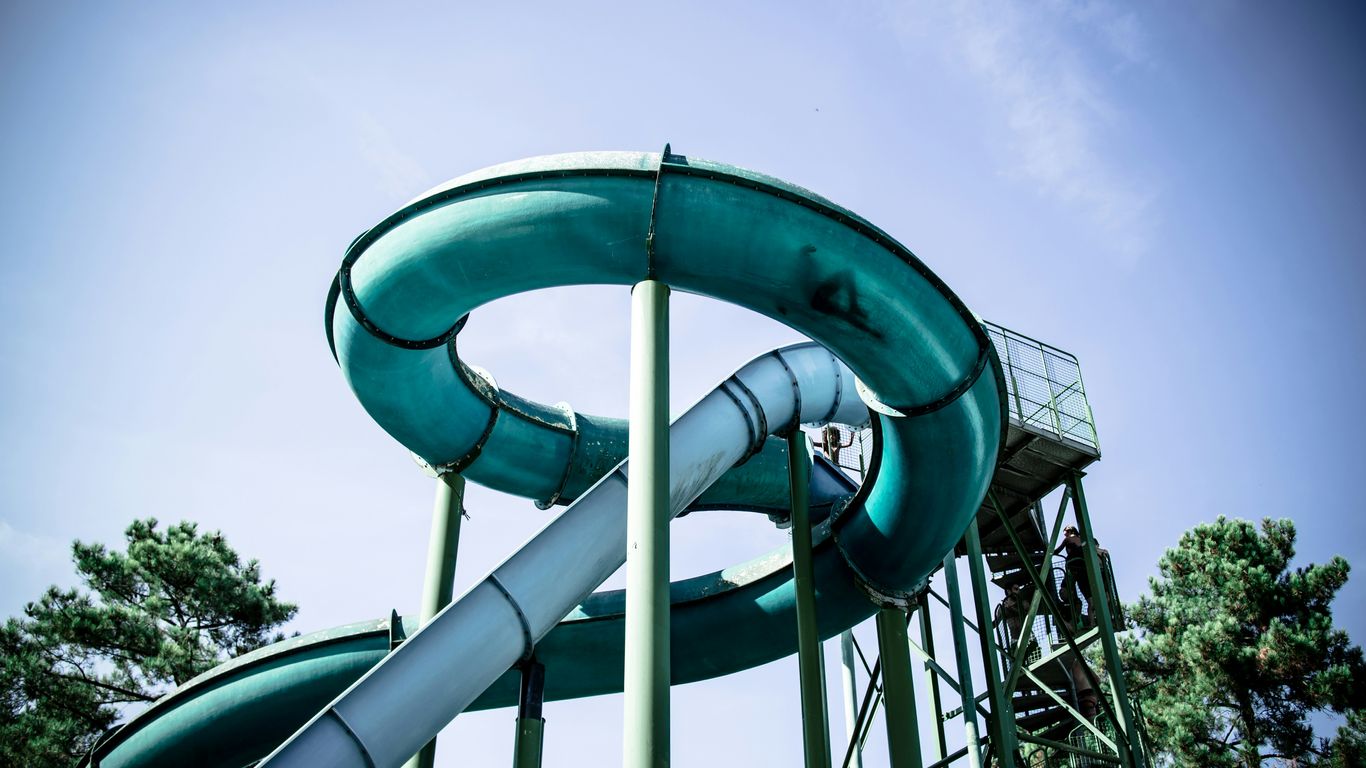 Thrill seekers on high speed slides
