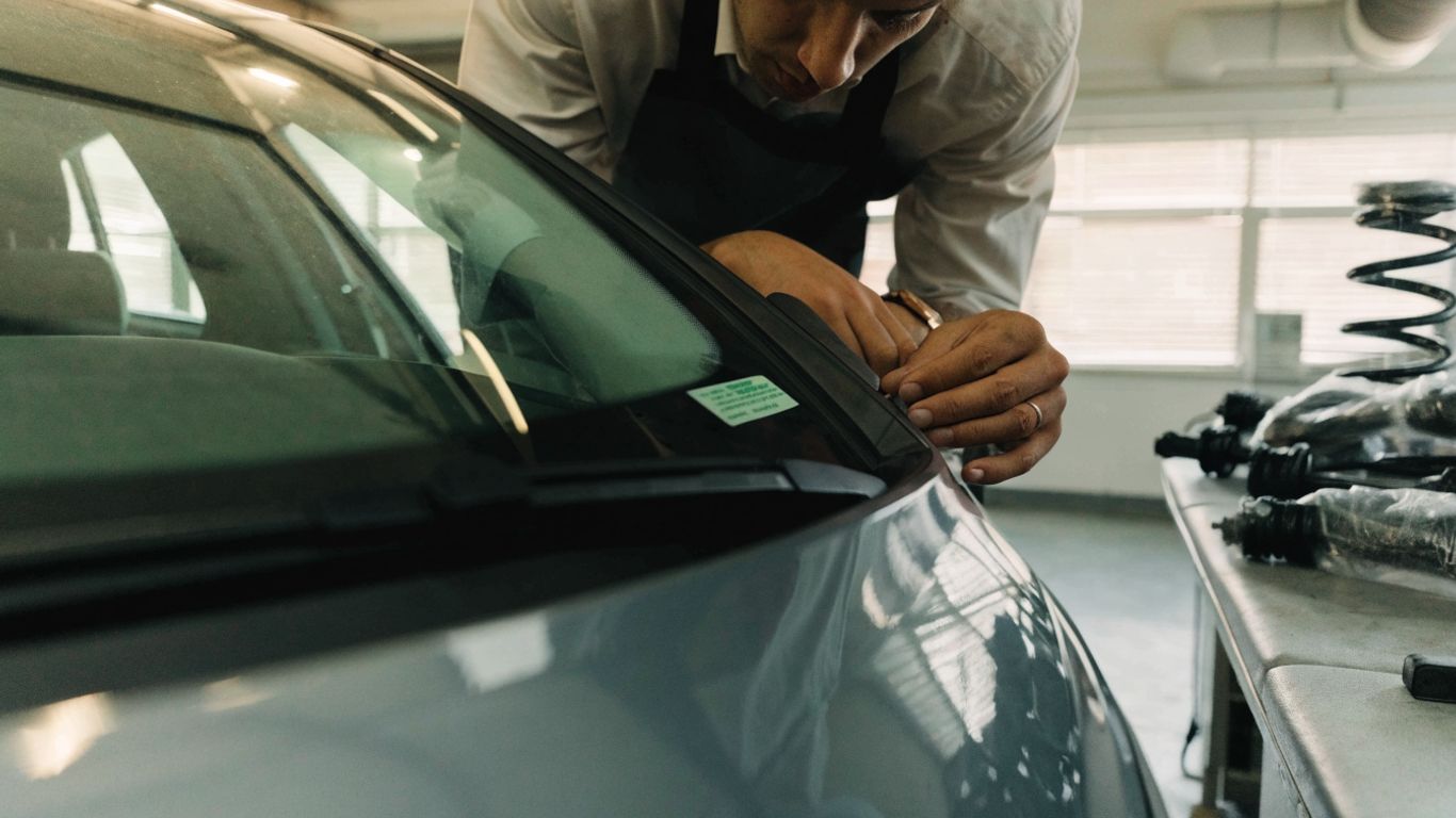 Audi suspension components beside a vehicle identification label