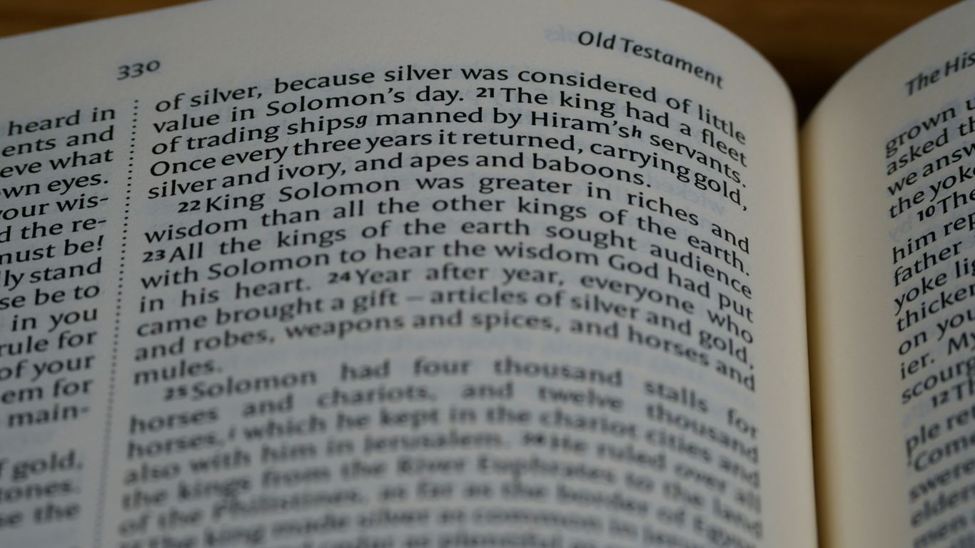 a close up of an open book on a table