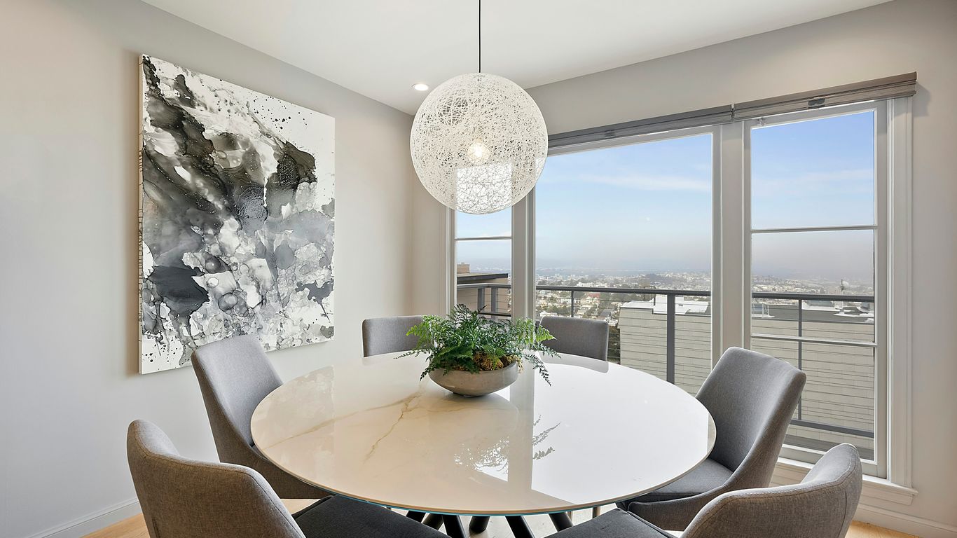 Round marble dining table in Singapore home