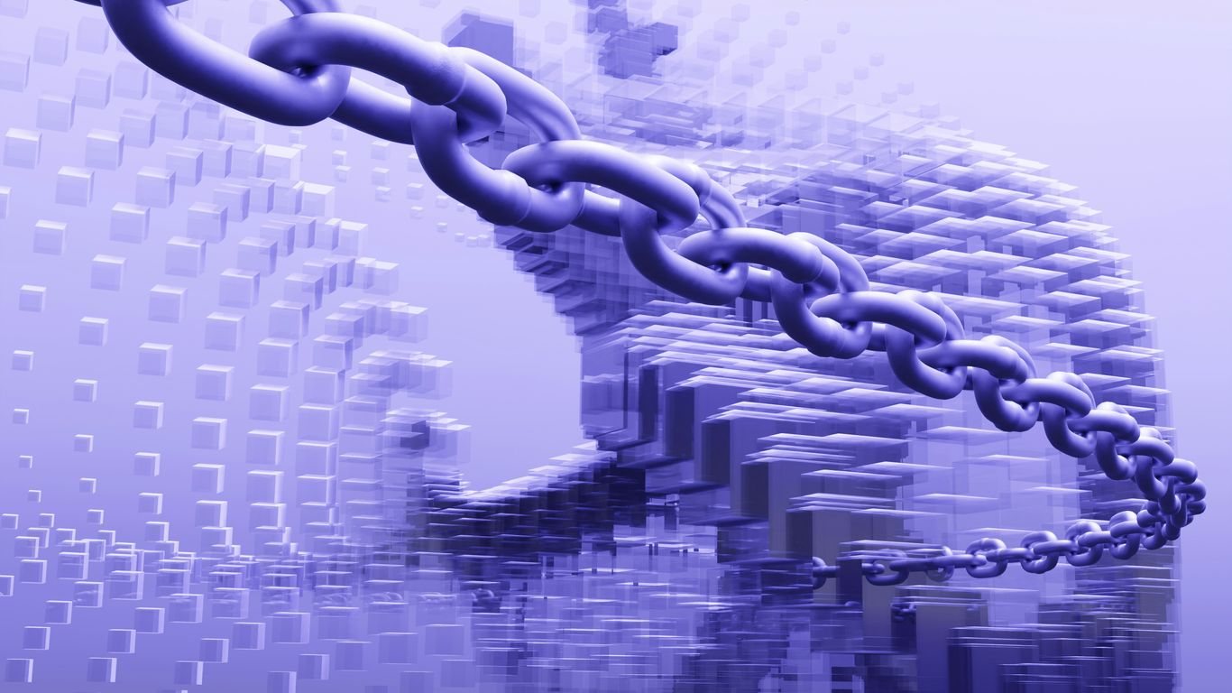 A large chain is attached to a building