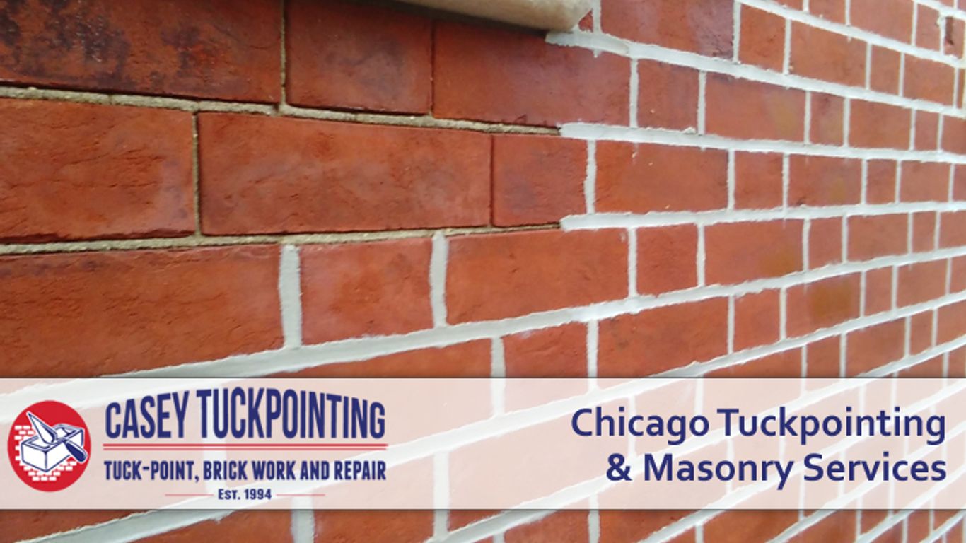Close-up of a brick wall with fresh tuckpointing and masonry services.