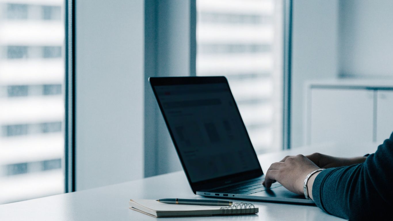 Trading account dashboard open on laptop screen