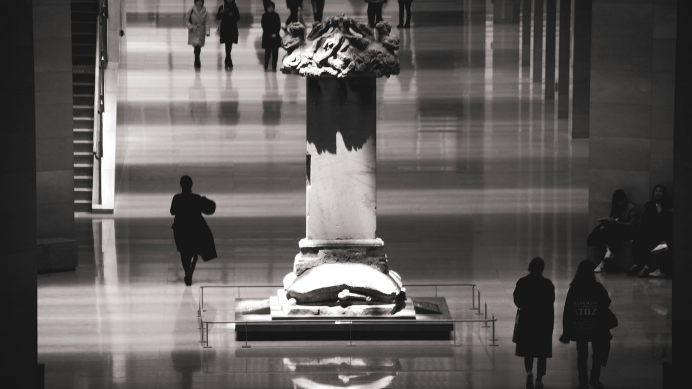 silhouette of person standing on white floor