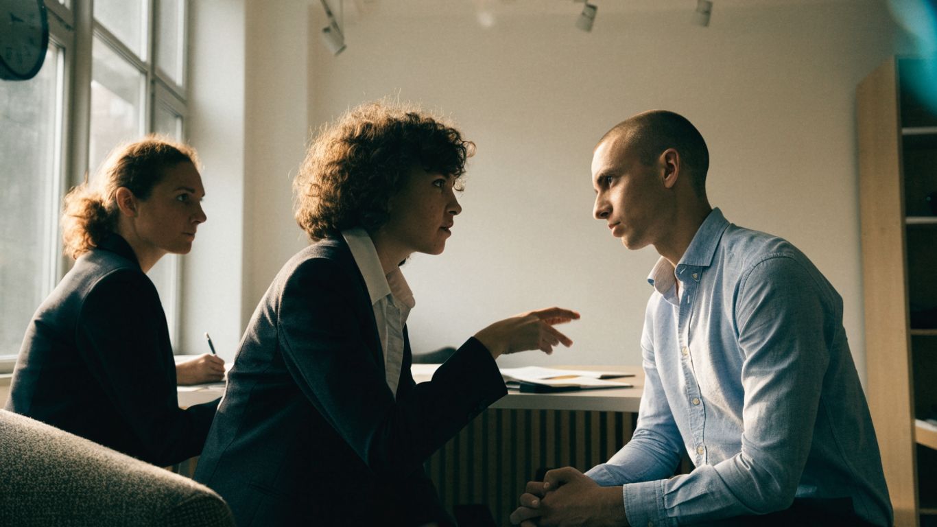Colleagues practicing a workplace conversation together