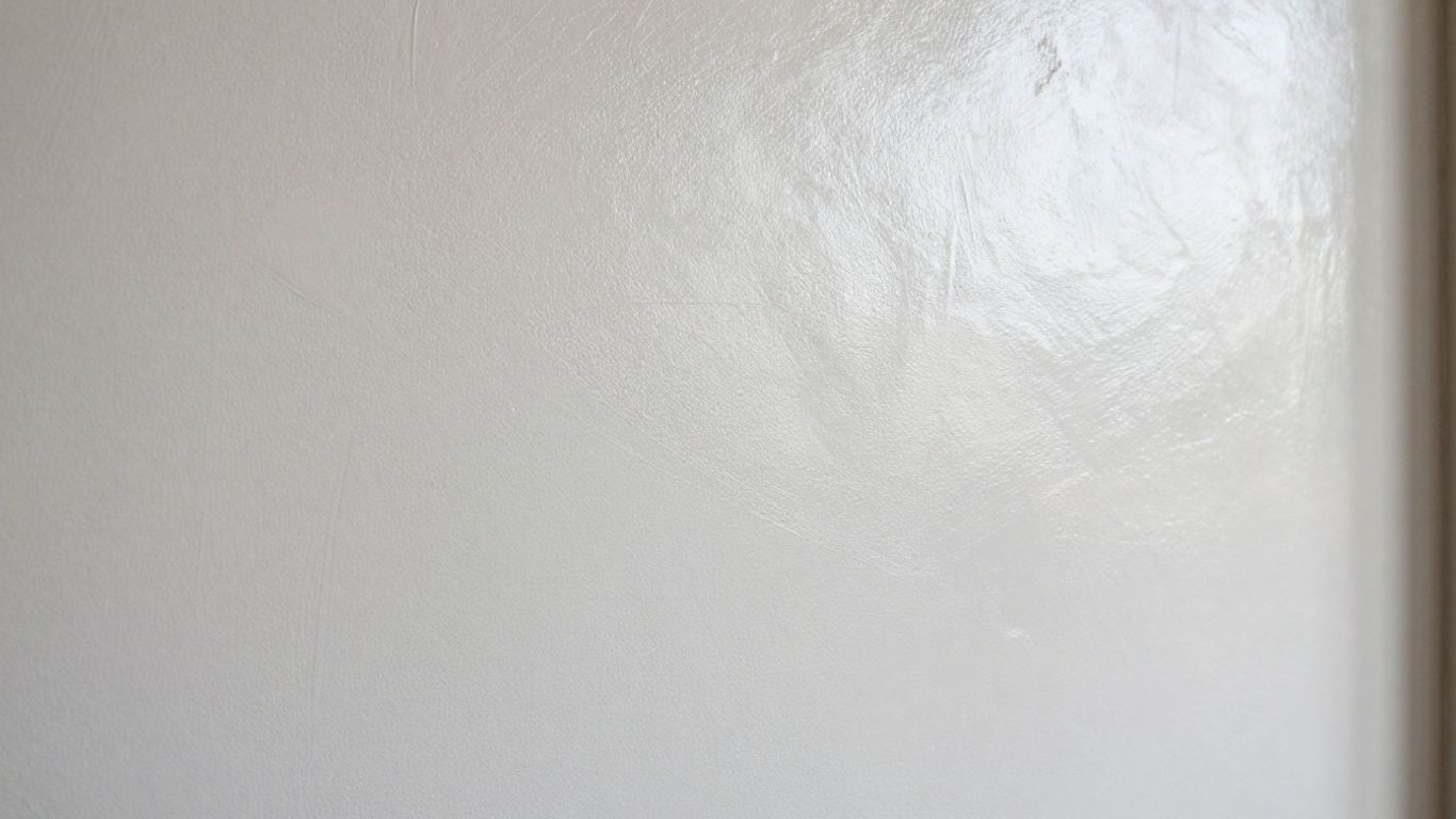 Close-up of smooth Venetian plaster wall texture.