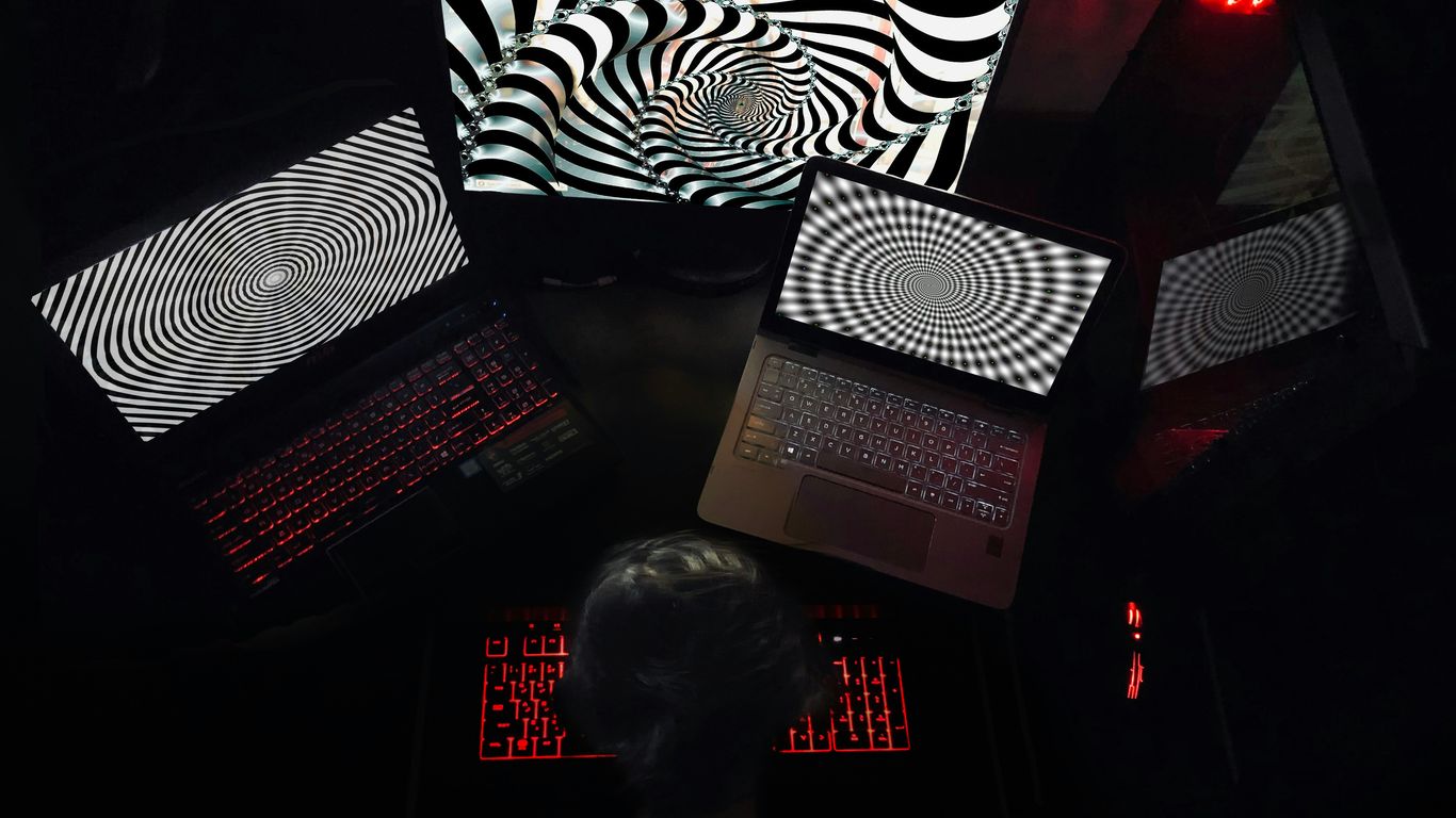 woman in white shirt sitting on chair