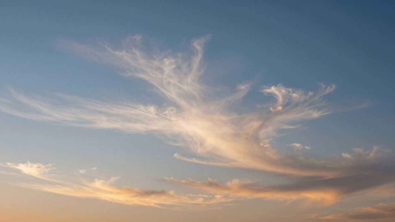 Clouds forming in a blue and orange sky.