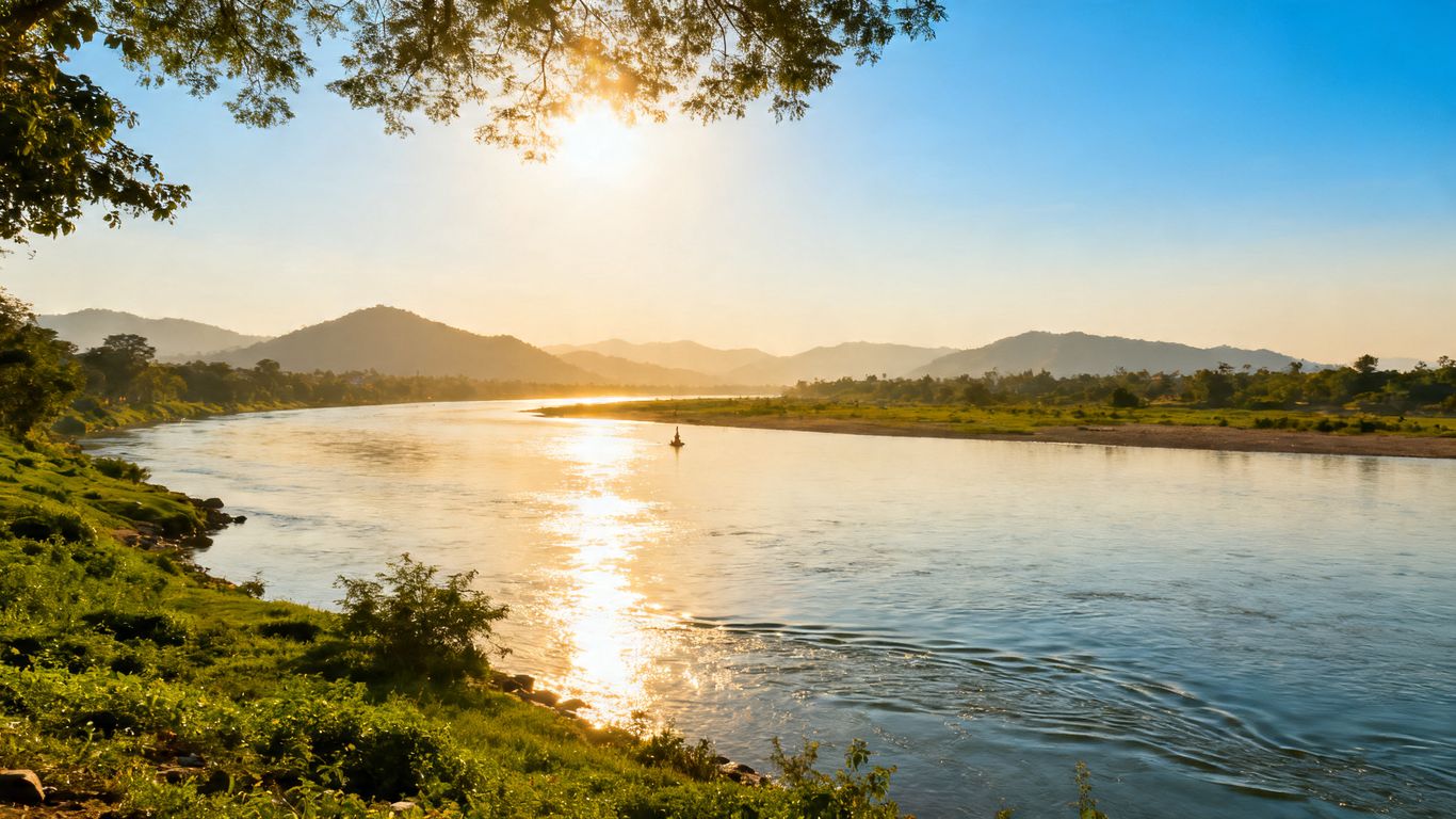 Sacred Indian rivers meeting under a clear sky.
