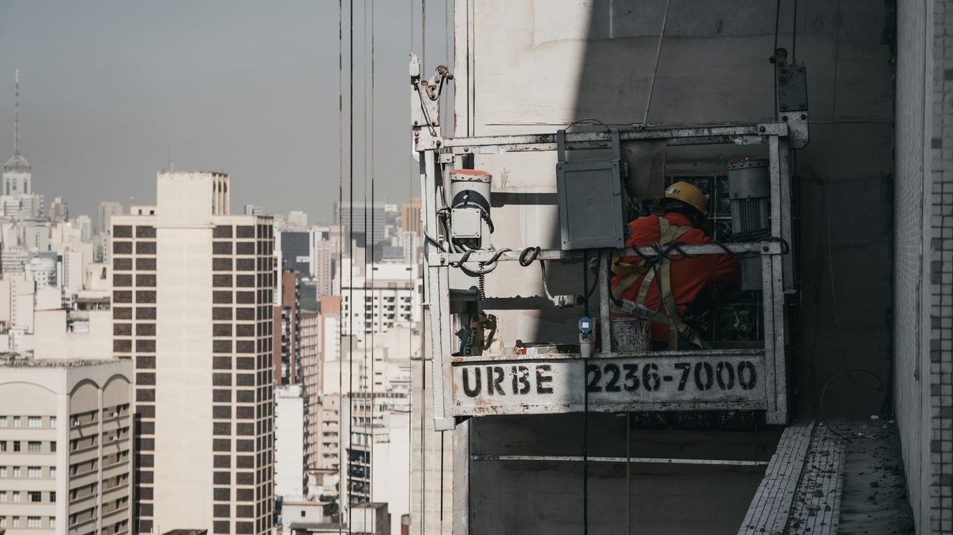 man working on building