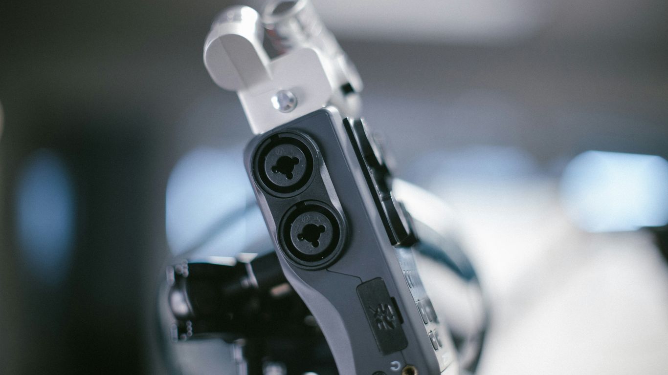 white and black game controller