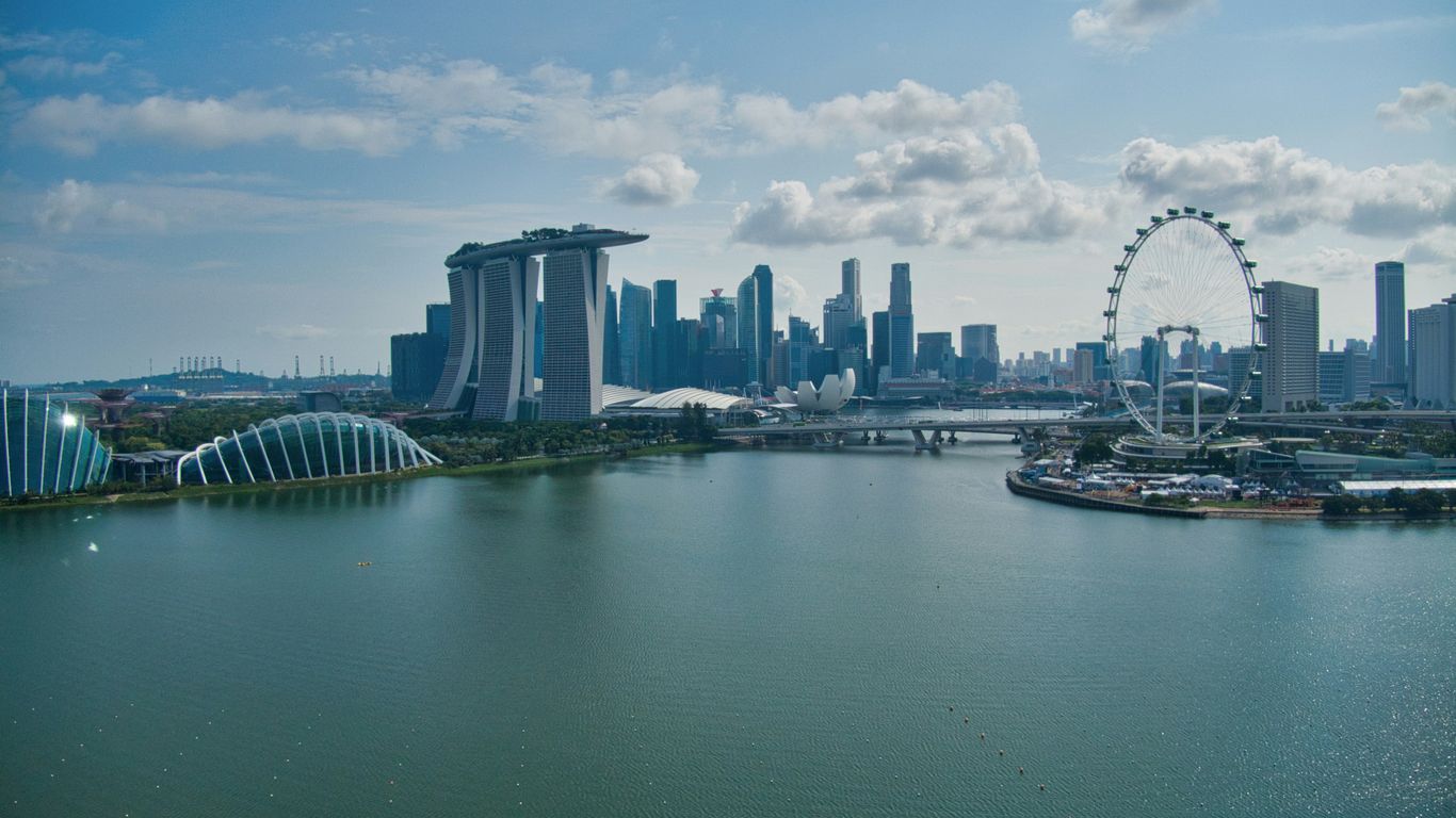 Colonial architecture beneath Singapore skyline