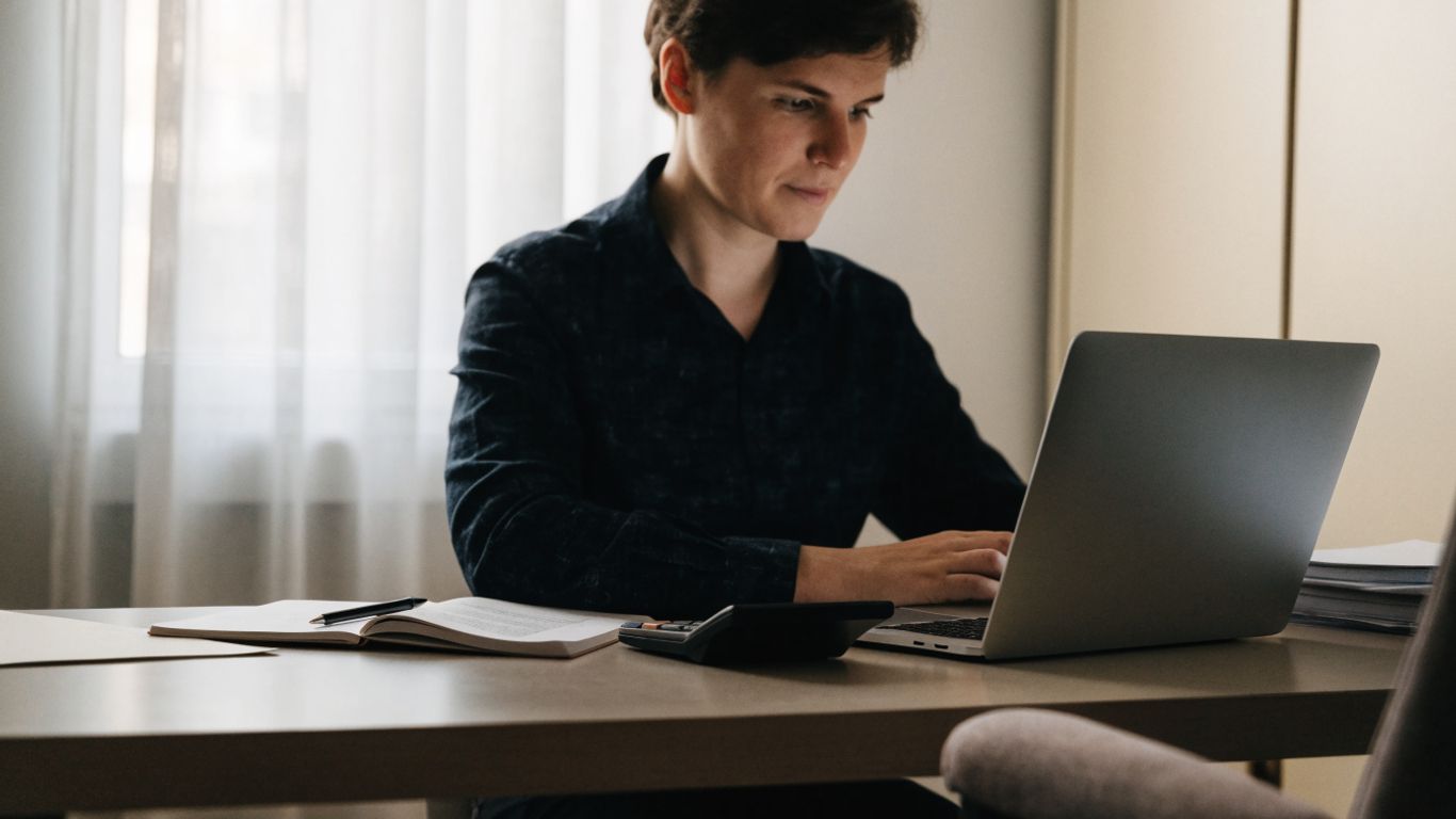 A trader reviewing a payout request at a desk