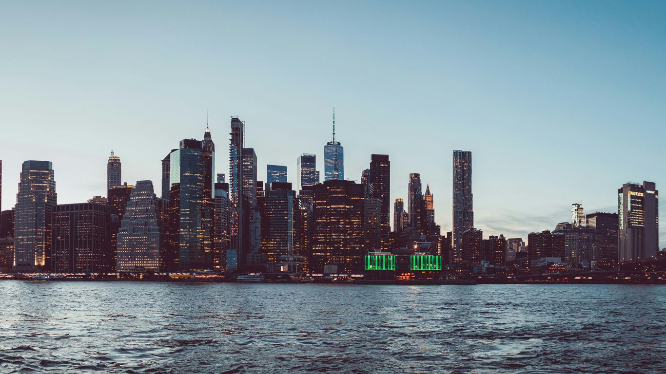 a view of a city skyline from the water