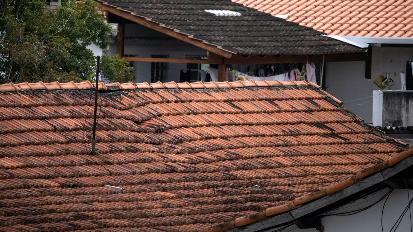 a roof with a few shingles