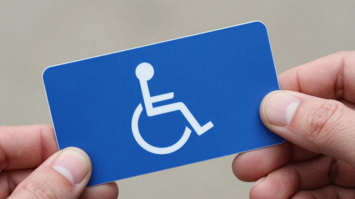 Disabled parking permit held in a hand.