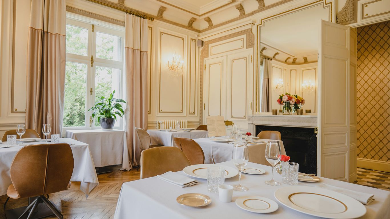 Hotel staff preparing an elegant dining room