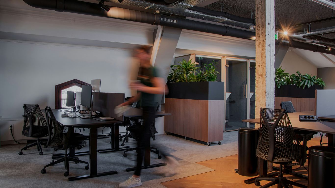 A colorful balance ball in a bright office