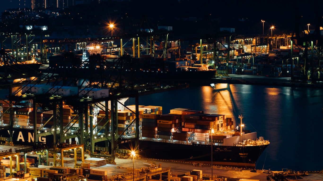 Cargo vessel moving through Singapore port waters