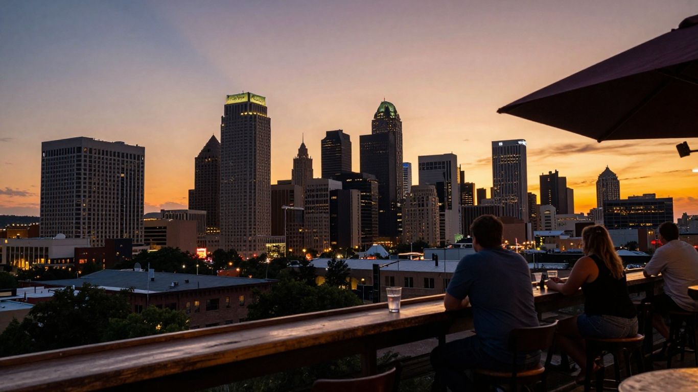 Austin skyline view from a rooftop bar at sunset.