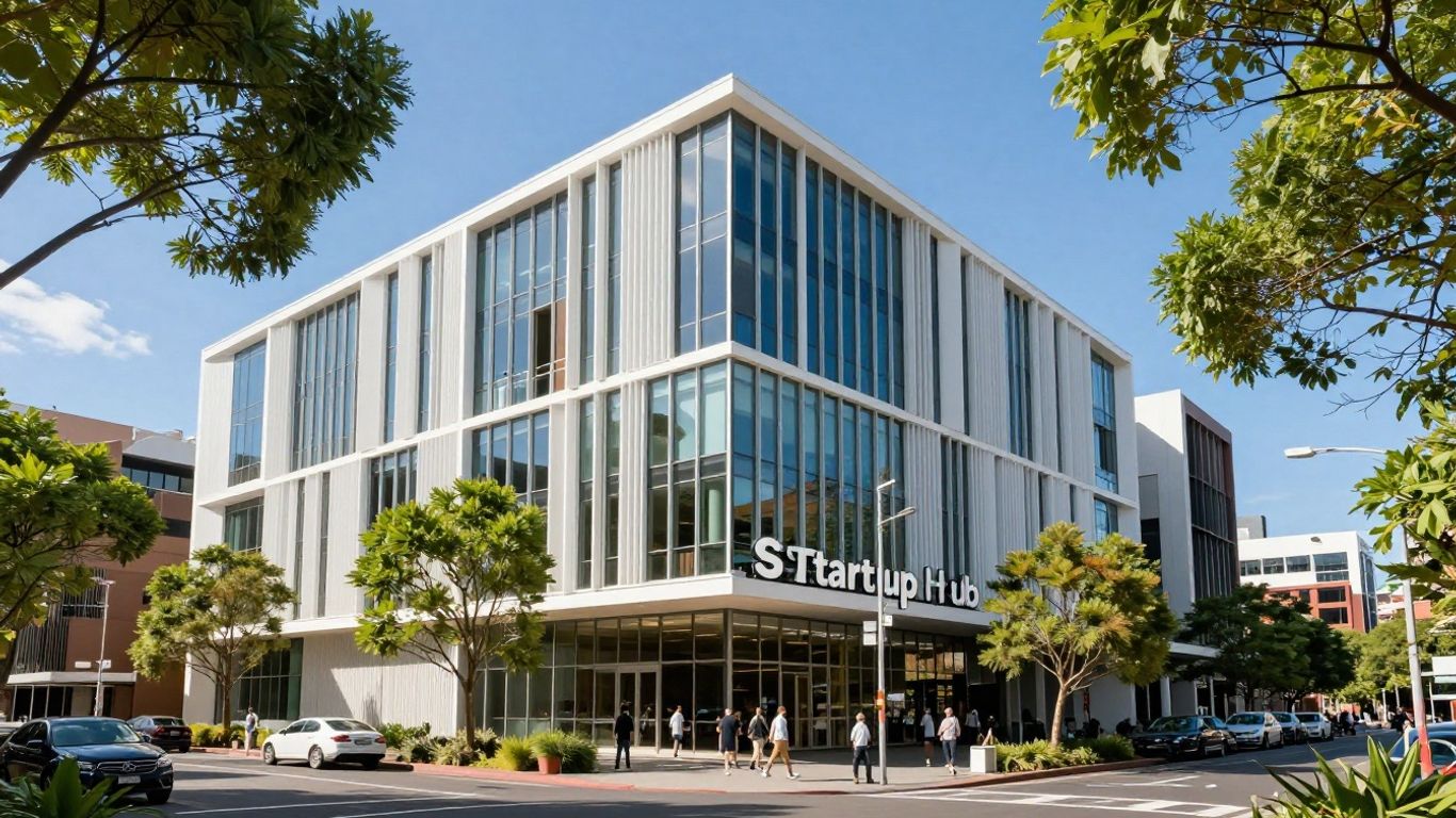 Sydney Startup Hub building exterior with trees and blue sky.