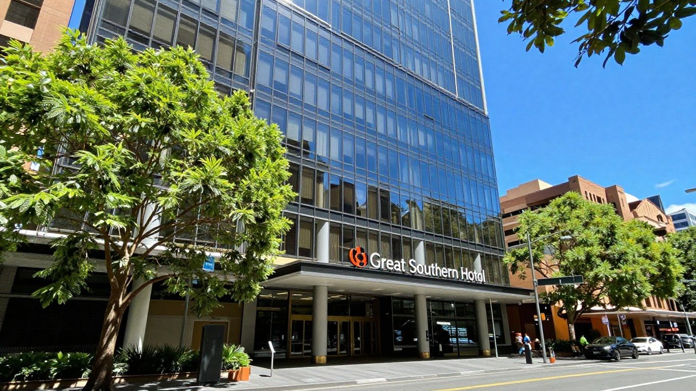 Great Southern Hotel Sydney exterior with trees and city background.