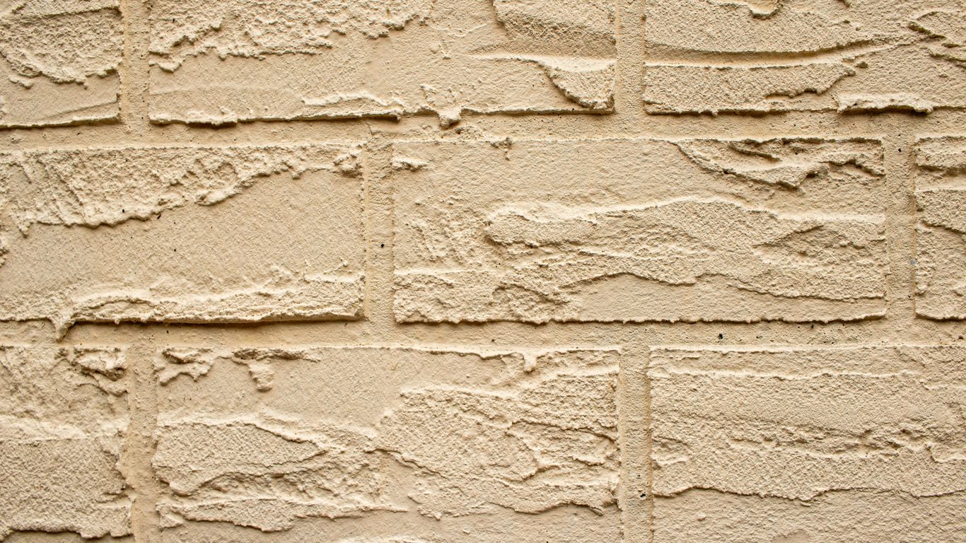 Textured wall with a brick pattern.
