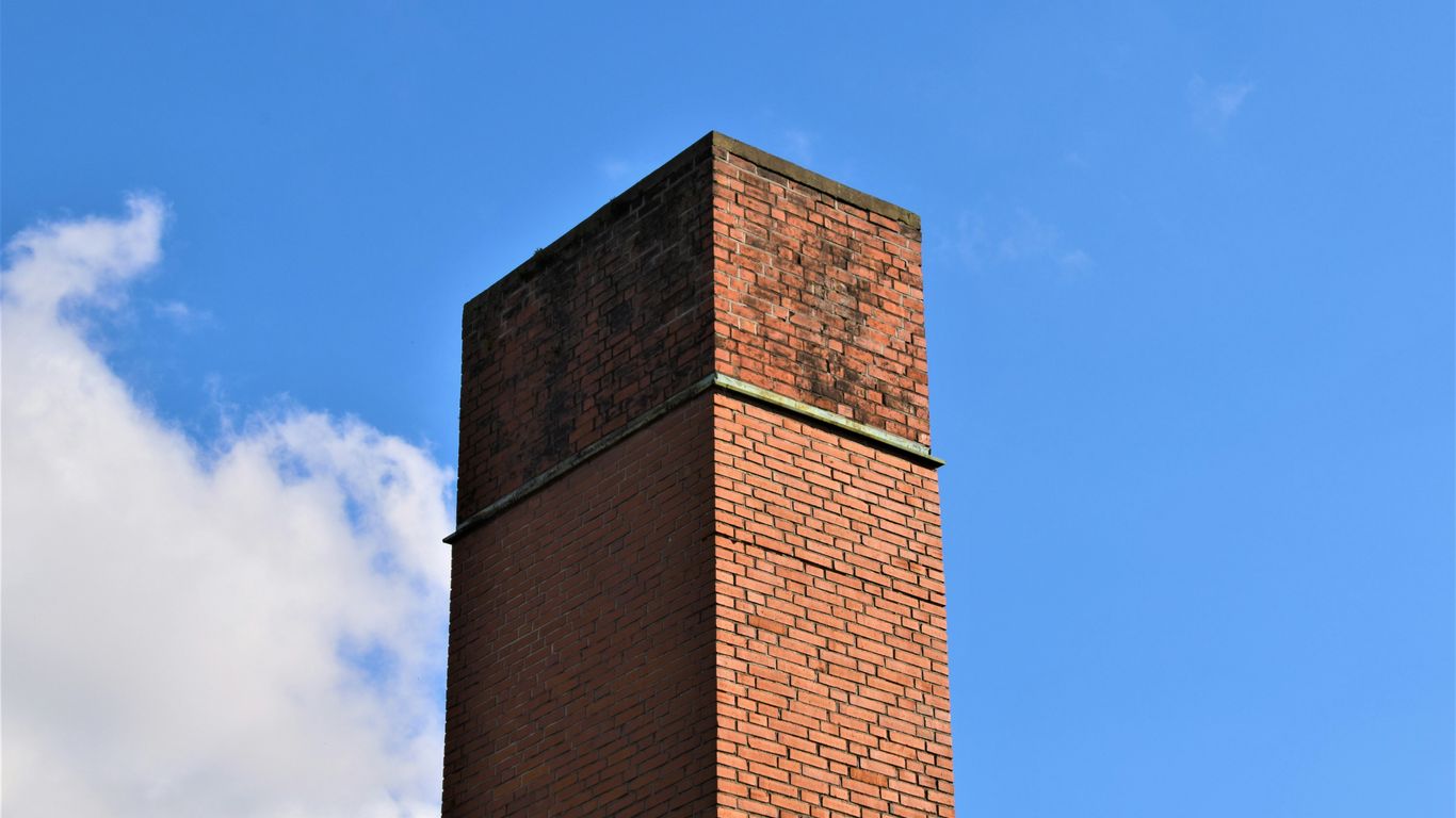 brown concrete building under blue sky during daytime