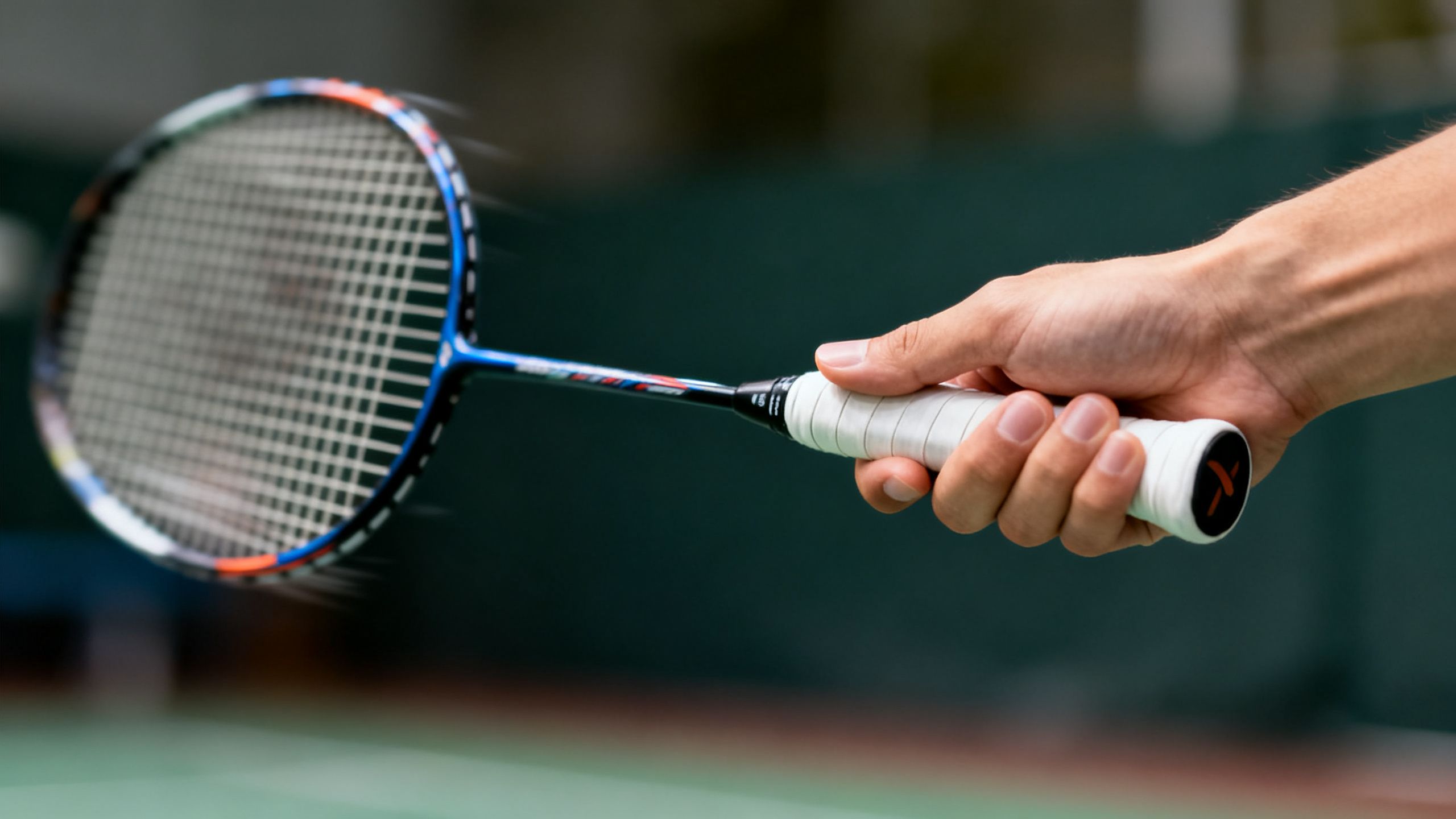 Badminton thumb grip for powerful backhand shots.