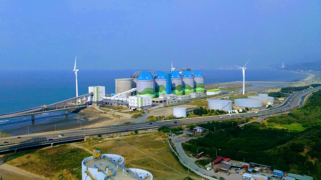 photo of blue and gray building during daytime