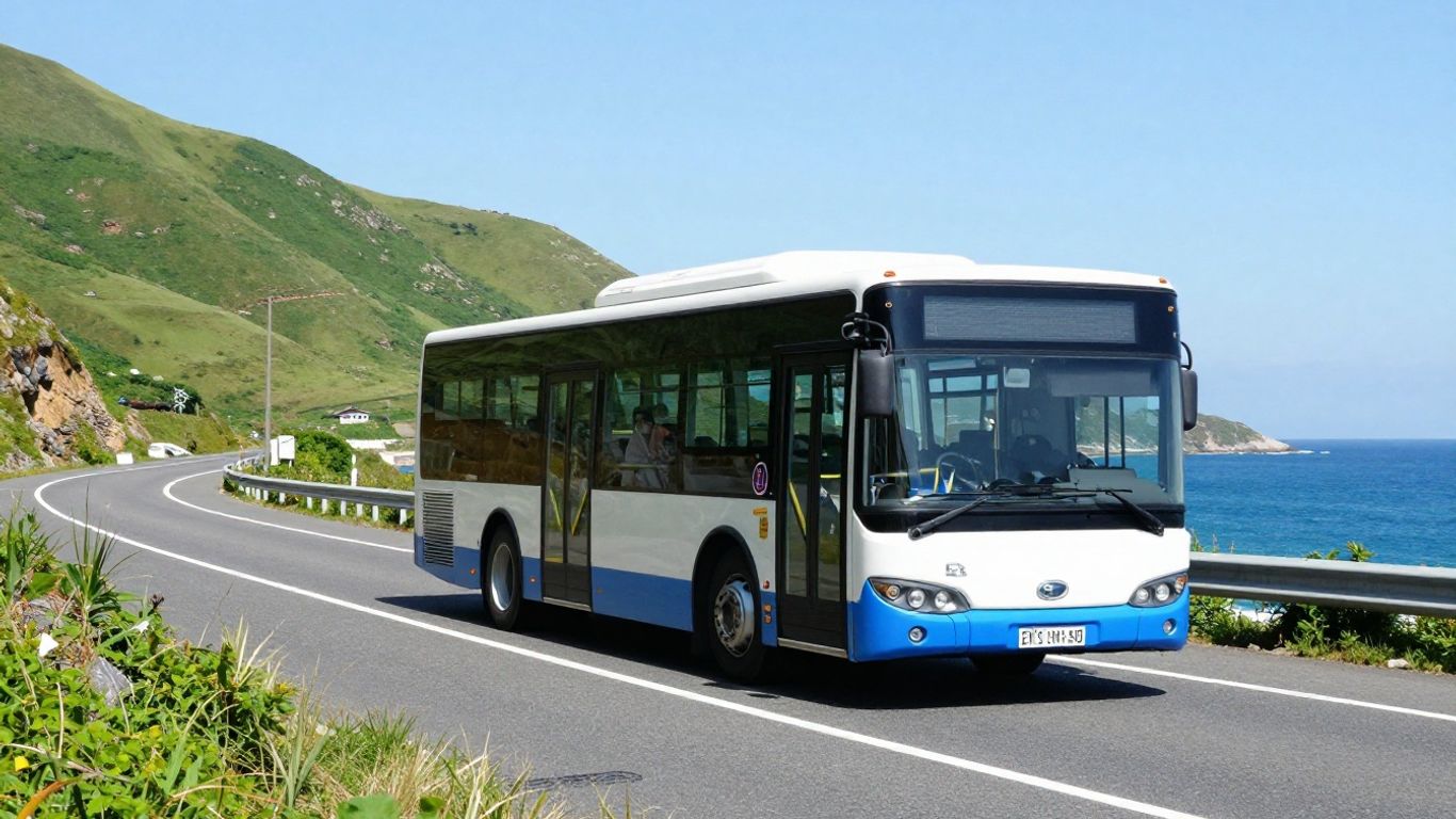 Bus travelling between Dover and Folkestone on a sunny day.