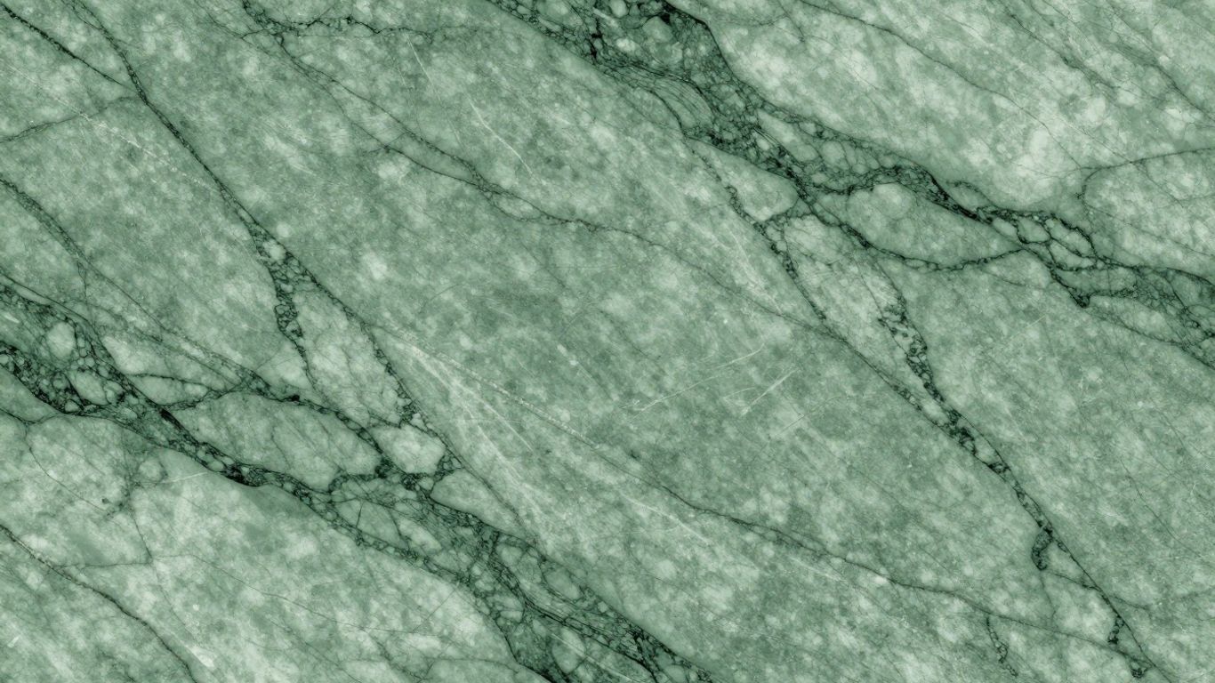 Verde Alpi marble slabs with green veining.