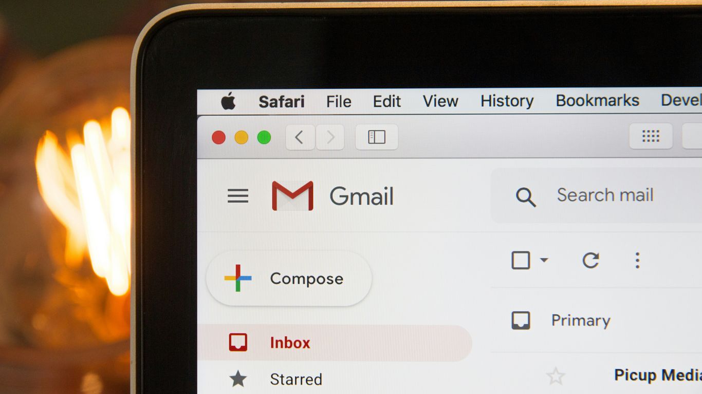 A professional email design displayed on a laptop screen