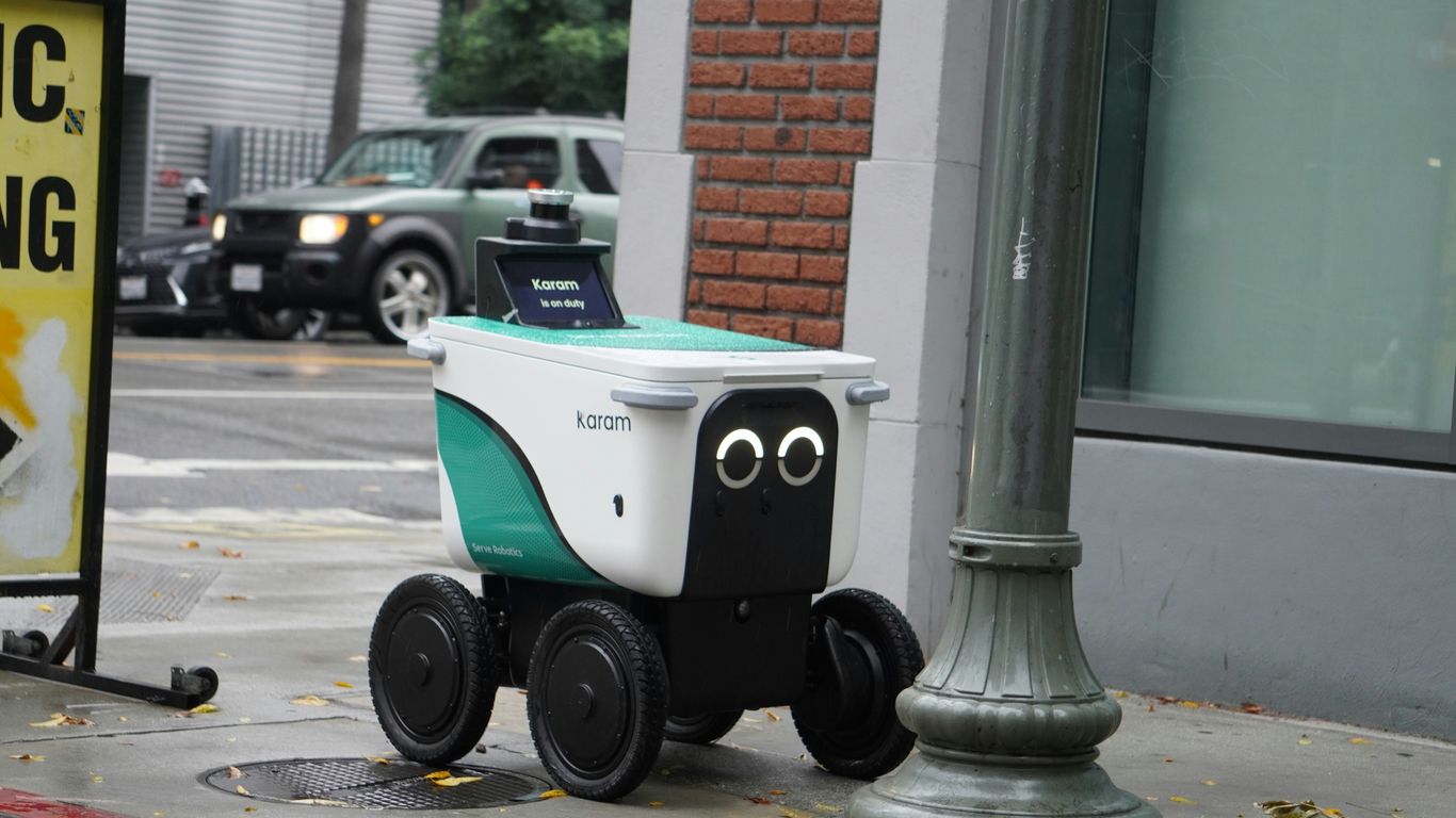 Sidewalk delivery robot near pedestrians