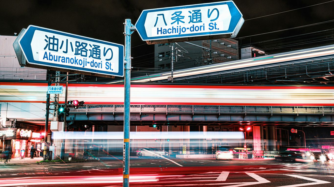 a street sign in front of a building