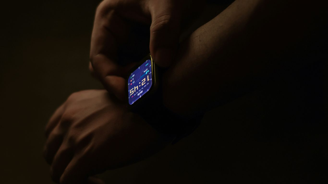 a person holding a smart phone in their hands