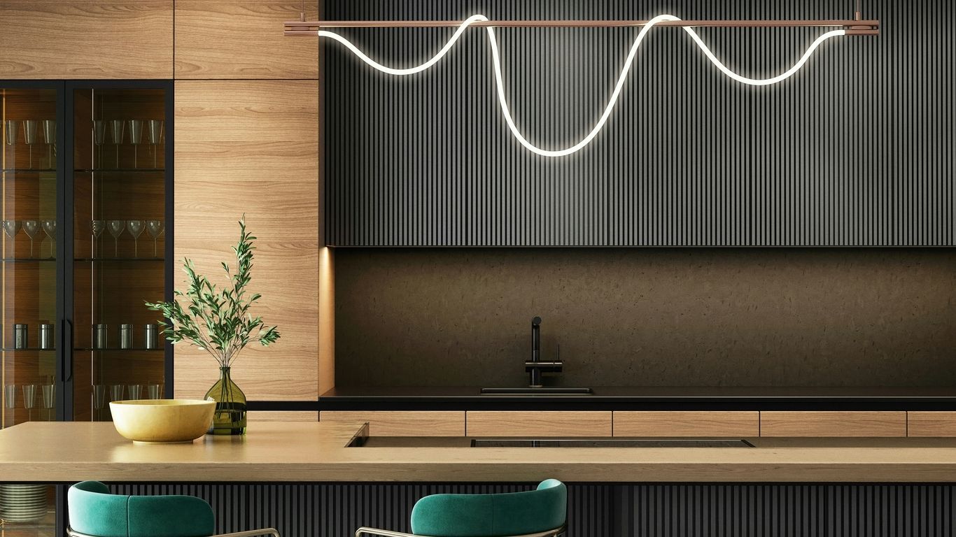 Sleek contemporary kitchen design with light wood cabinets