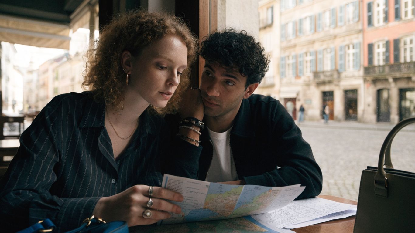 A couple planning their European weekend journey