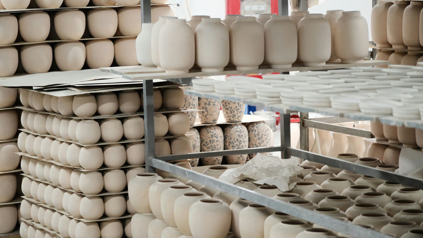 Ceramic factory production line with stacked plates