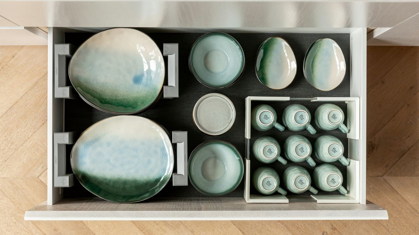 a box with a bunch of dishes inside of it