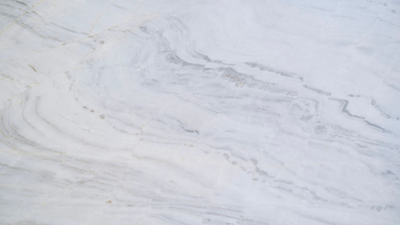 Close view of veined marble tabletop